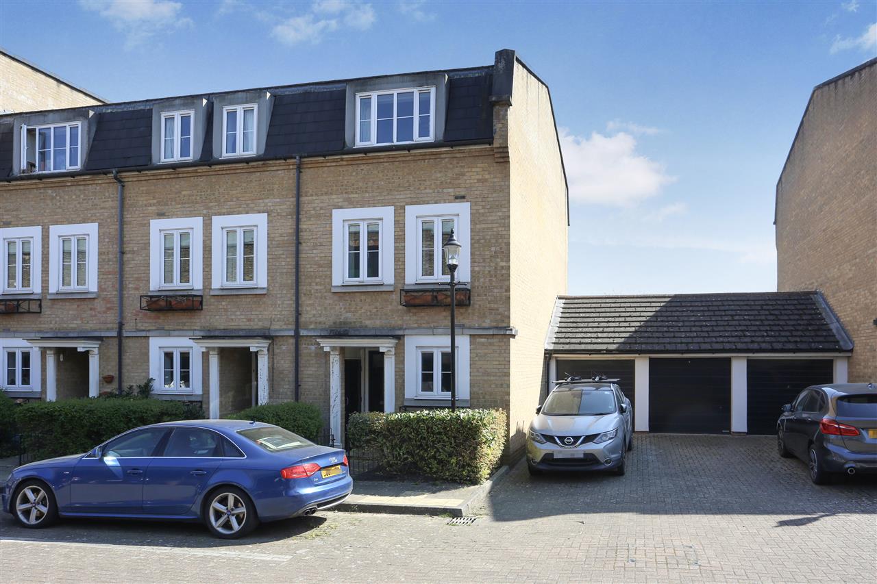 NEW LISTING! Positioned on arguably the largest plot, a spacious and well presented (approximately 1307 Sq Ft / 121 Sq M including garage) three storey end of terrace townhouse forming part of a sought after modern gated development that includes well maintained communal gardens. The ...