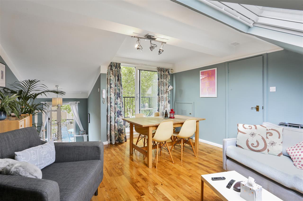 CHAIN FREE! An immaculately presented and very spacious (approximately 980 Sq Ft / 91 Sq M including eaves storage and restricted head height area) apartment occupying the second and third floors of an imposing end of terrace Victorian property situated in a sought after location within moments ...