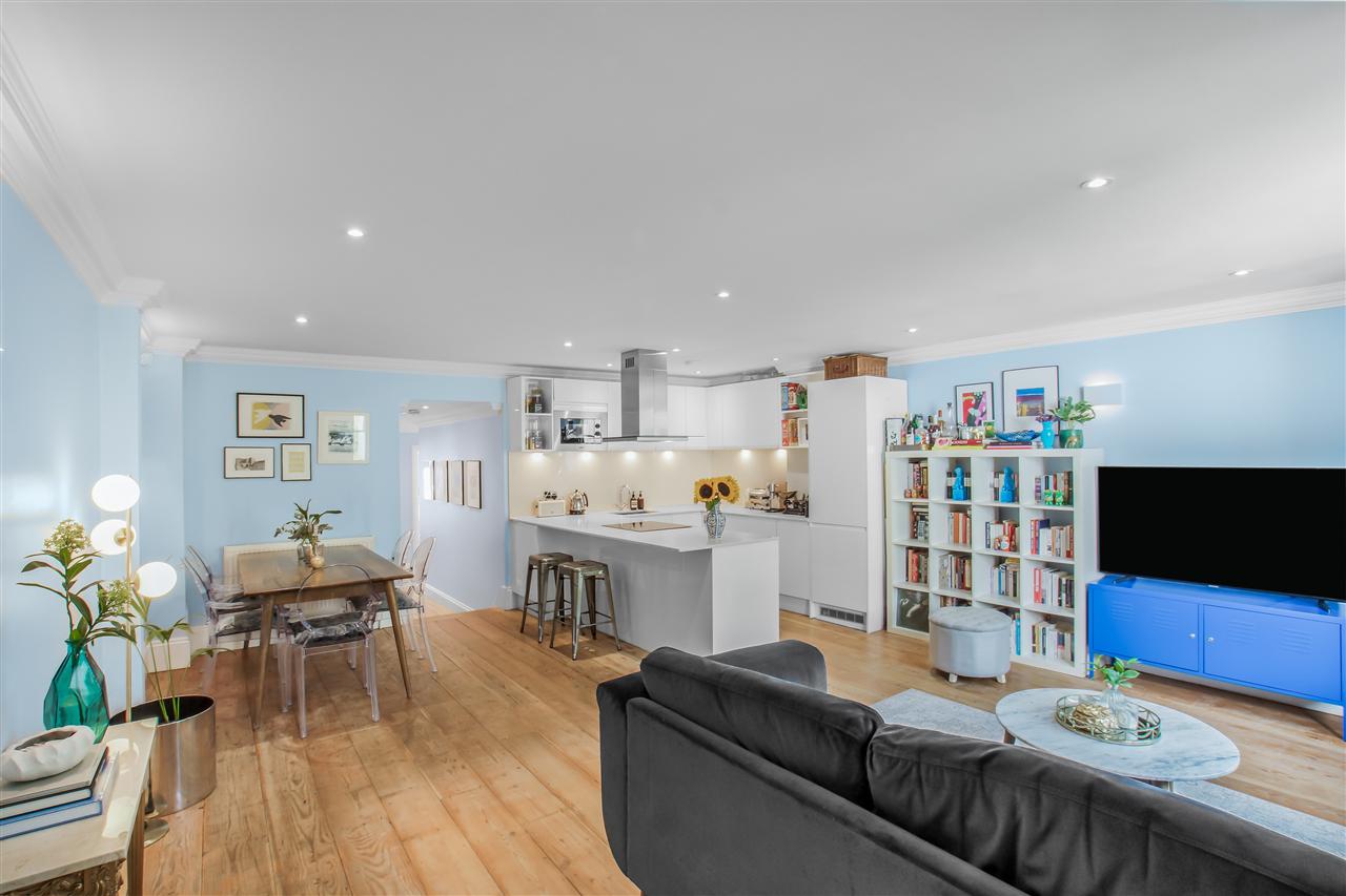 A truly stunning, immaculately presented and very spacious (approximately 958 Sq Ft / 89 Sq M) garden apartment approached via its own front door and courtyard front garden, forming part of an imposing converted Victorian property situated in one of Archway's premier turnings. The property is ...