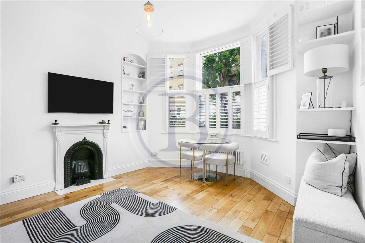 A beautifully finished ground floor flat (approx. 412 sq.ft / 38 sq.m) set within a charming Victorian red brick building on a desirable side street in the heart of Kentish Town. The property offers a light-filled bay-fronted reception/dining room with a feature fireplace, a fitted kitchen, a ...