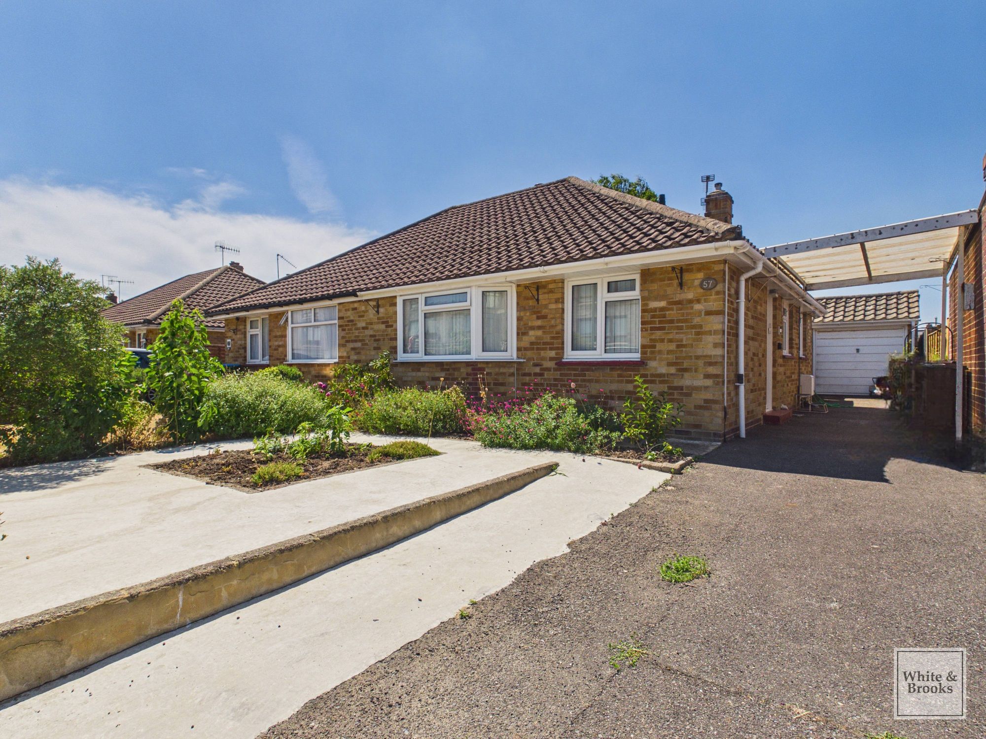 This attractive semi-detached bungalow offers a thoughtfully arranged layout with two comfortable bedrooms, a modern family bathroom, and a spacious reception room.