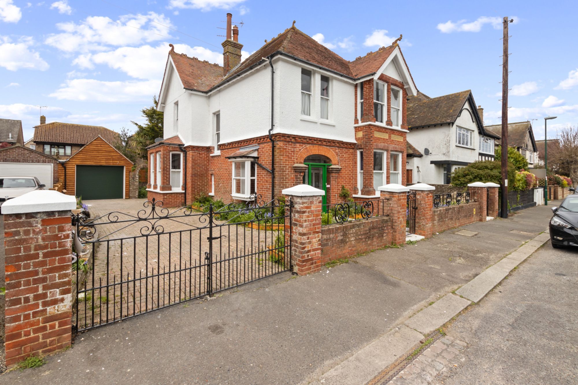 This impressive four-bedroom, two-bathroom detached house showcases a harmonious blend of period features and practical family living.