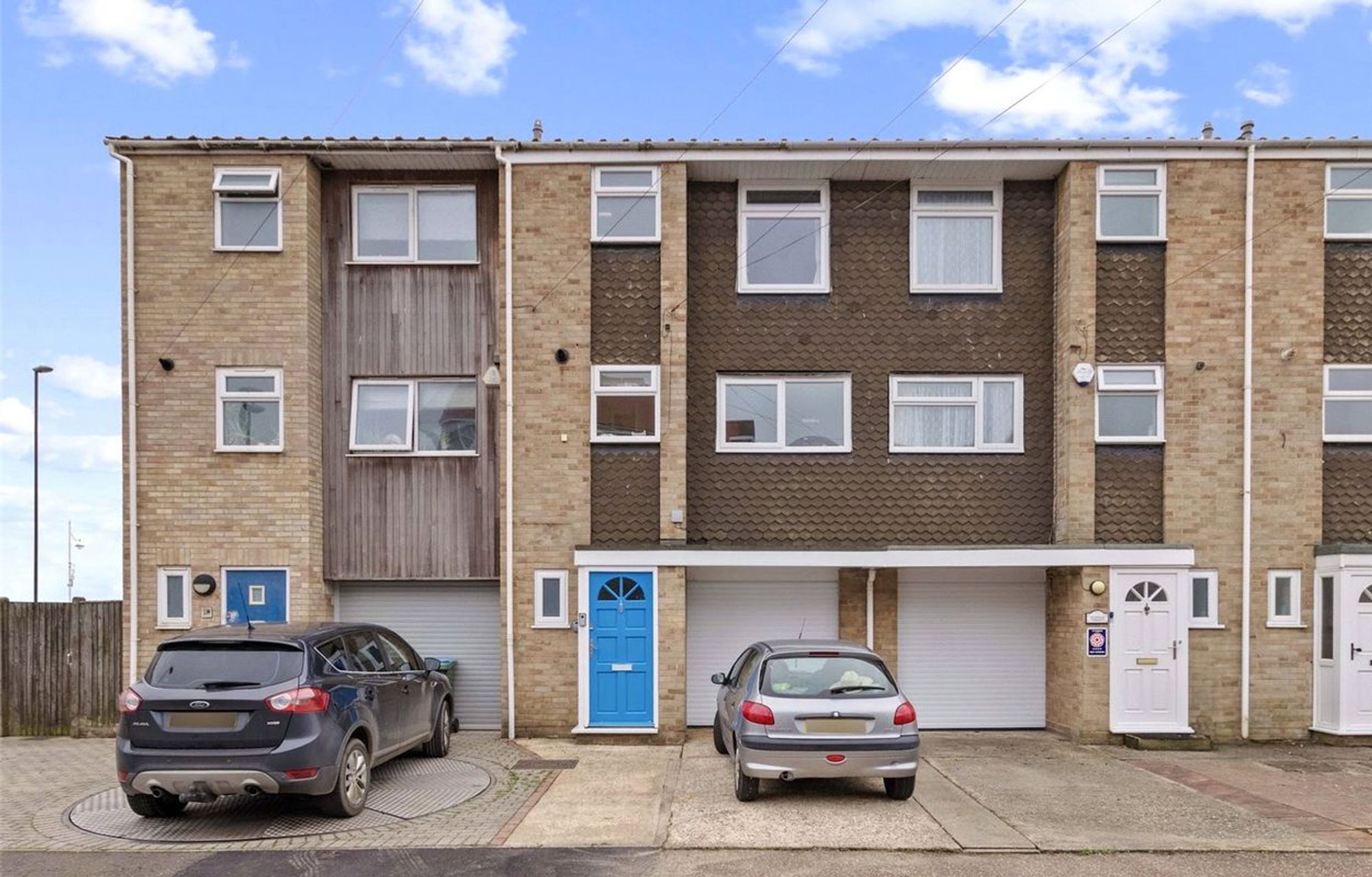 This impressive three-bedroom, three-bathroom terraced town house, perfectly blends modern style with practical family living.