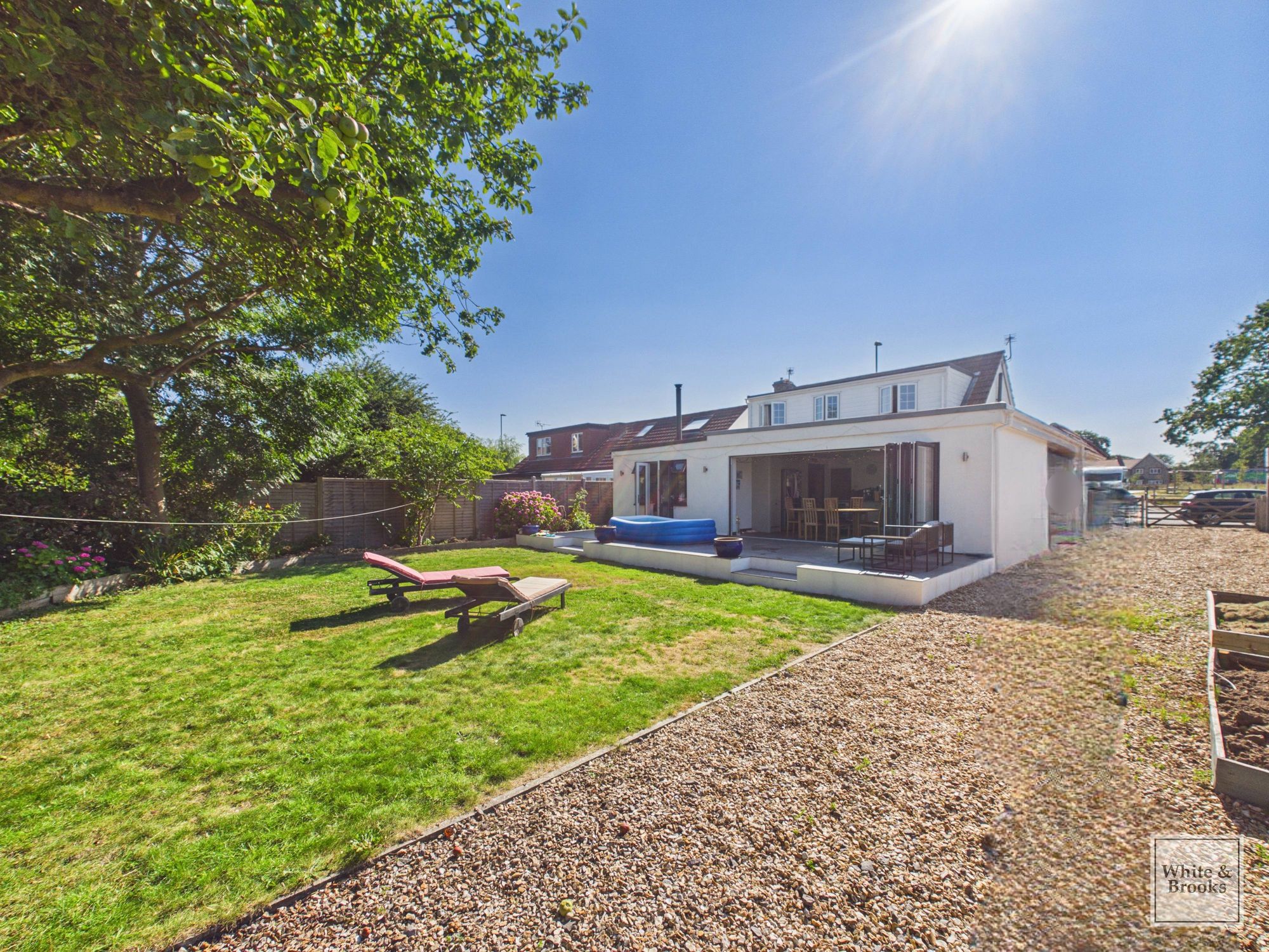 This exceptional three-bedroom, two-bathroom detached chalet offers an outstanding blend of spacious living, modern design and superb outdoor amenities.